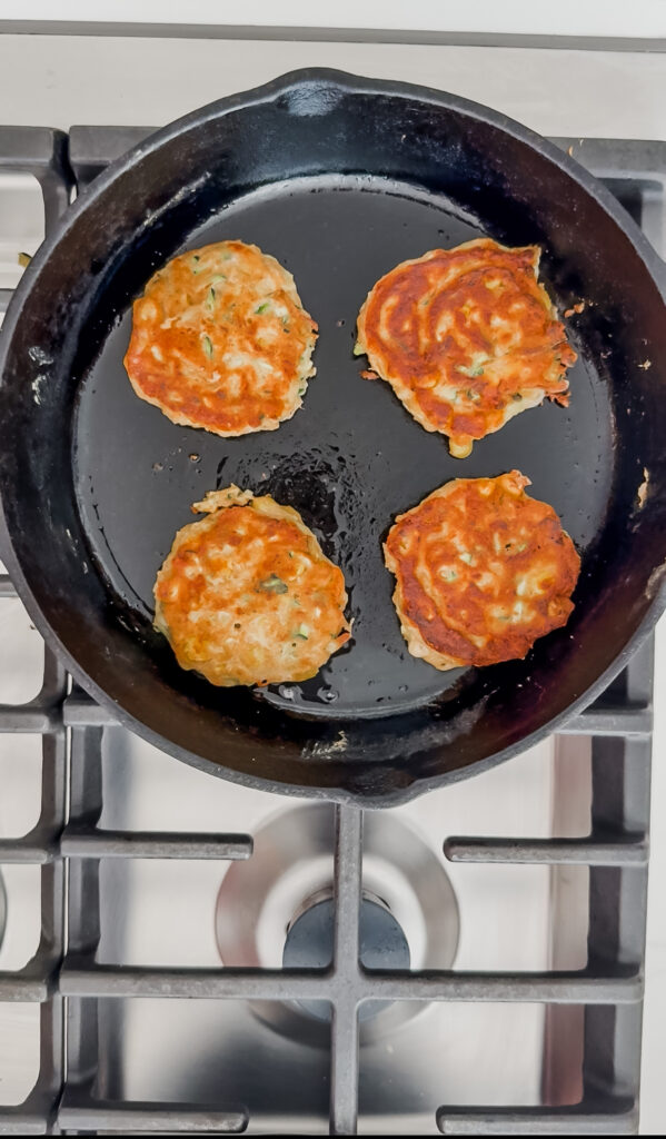 four Zucchini Corn Fritters on pan